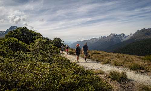 Guests hiking up to Key Summit on the Routeburn Track